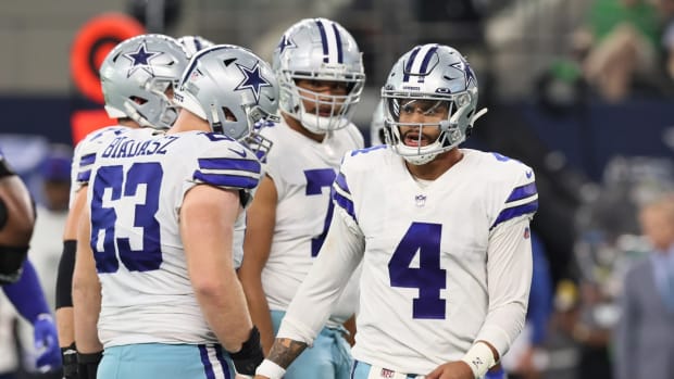 Oct 10, 2021; Arlington, Texas, USA; Dallas Cowboys quarterback Dak Prescott (4) looks on in the fourth quarter against the New York Giants at AT&amp;T Stadium. Mandatory Credit: Matthew Emmons-USA TODAY Sports